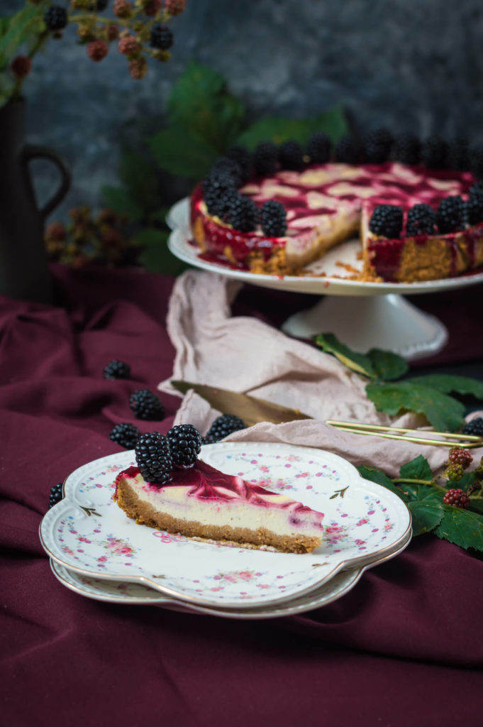 Slice of blackberry swirled cheesecake