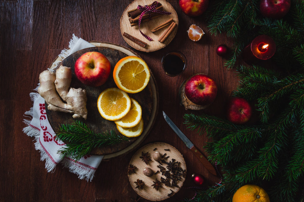 Overhead view of ingredients for stovetop DIY Christmas simmer pot