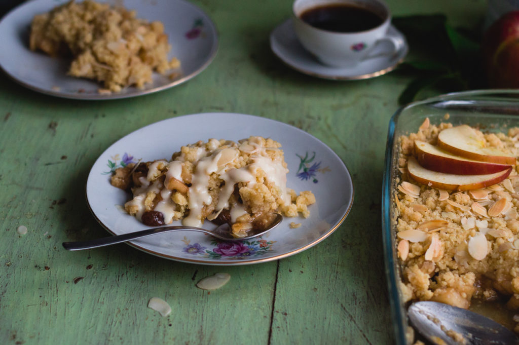 apple crumble covered with butter cardamom sauce