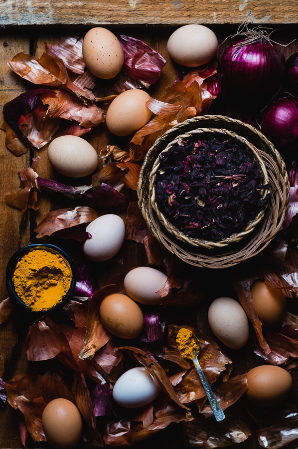 easter eggs ready to be dyed naturally with onion skins, hibiscus tea and turmeric