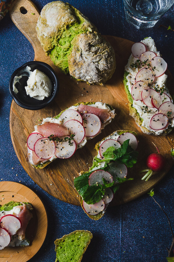 toast made of wild garlic soda bread, cheese spread and radishes