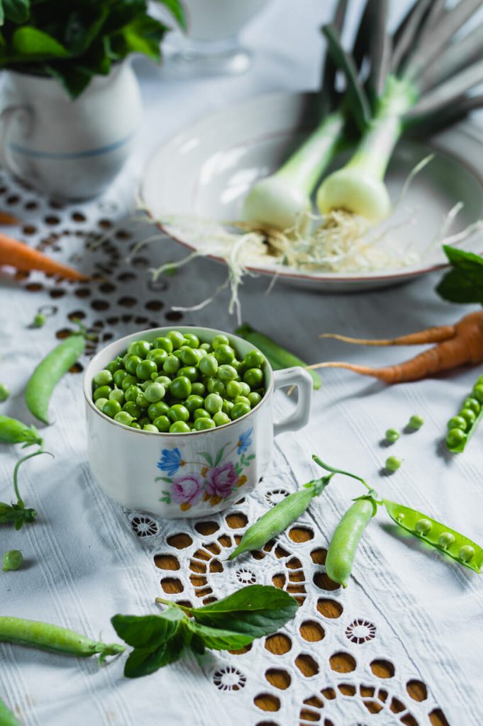 ingredients for making creamy young pea and mint soup