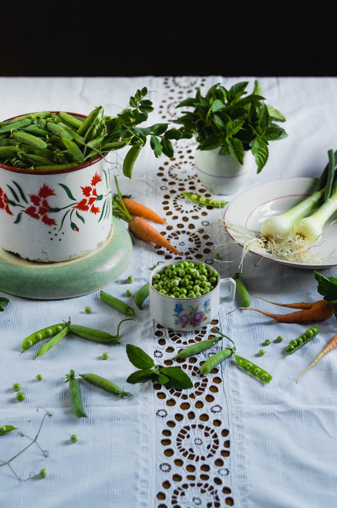 ingredients for making creamy young pea and mint soup