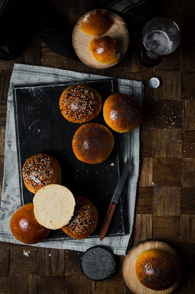 freshly baked brioche burger buns, showed from above