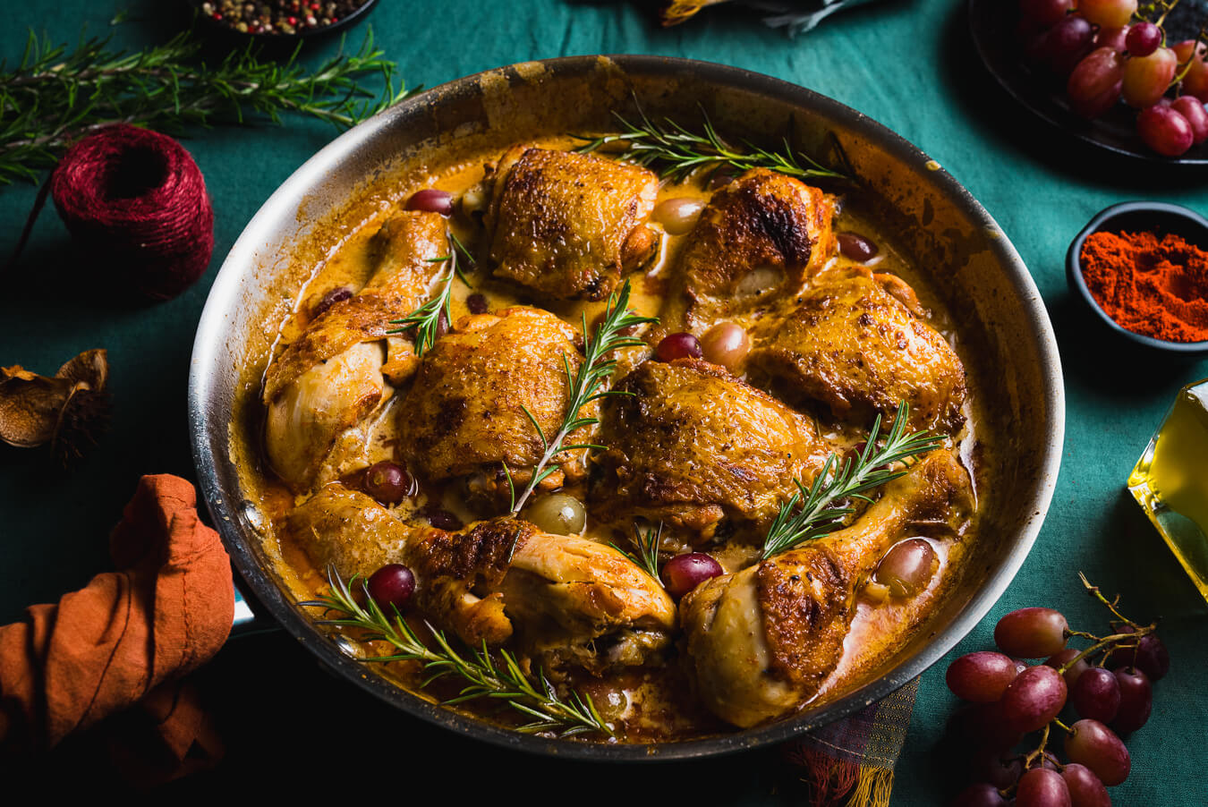 chicken in white wine sauce with grapes and rosemary