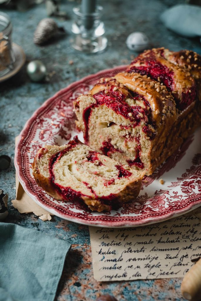 freshly cut raspberry brioche babka