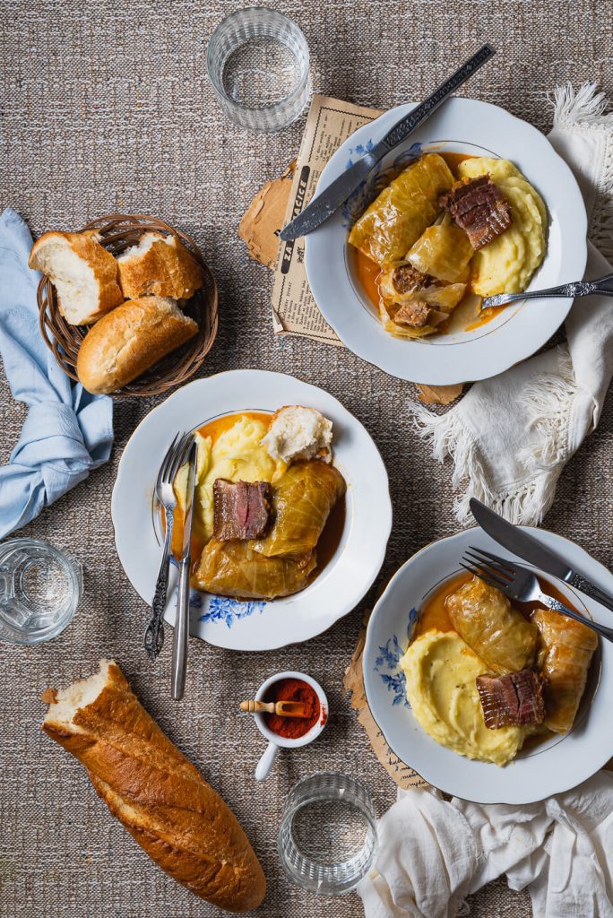 croatian sarma cabbage rolls served with white bread and mashed potatoes