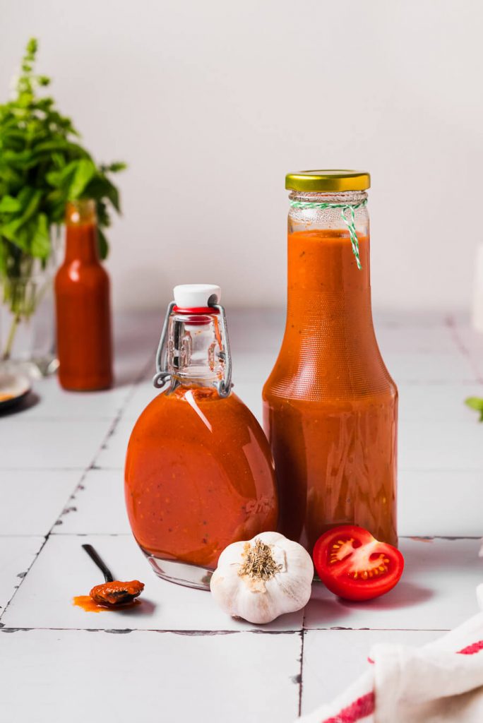 two bottles of homemade ketchup made from fresh tomatoes