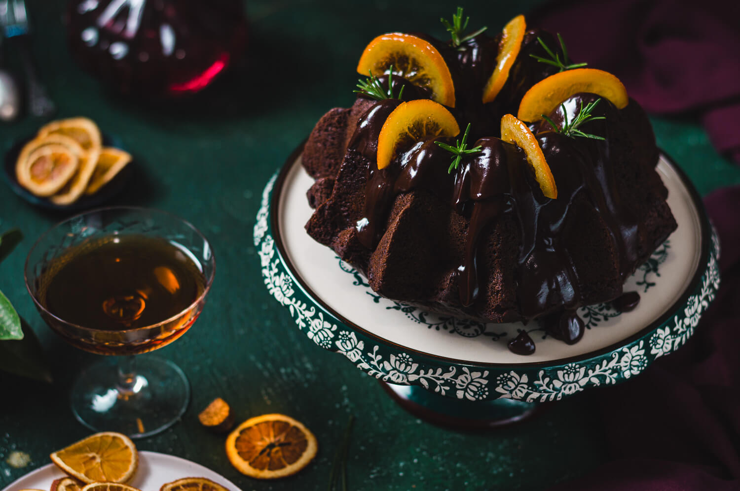 carob and orange bundt cake covered in dark chocolate ganache