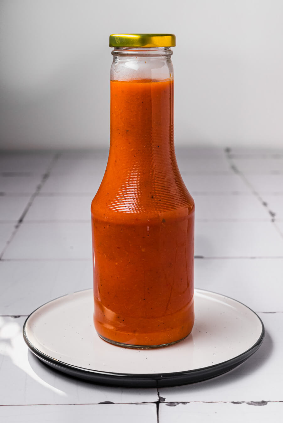 homemade ketchup made from fresh tomatoes in a sterilized bottle