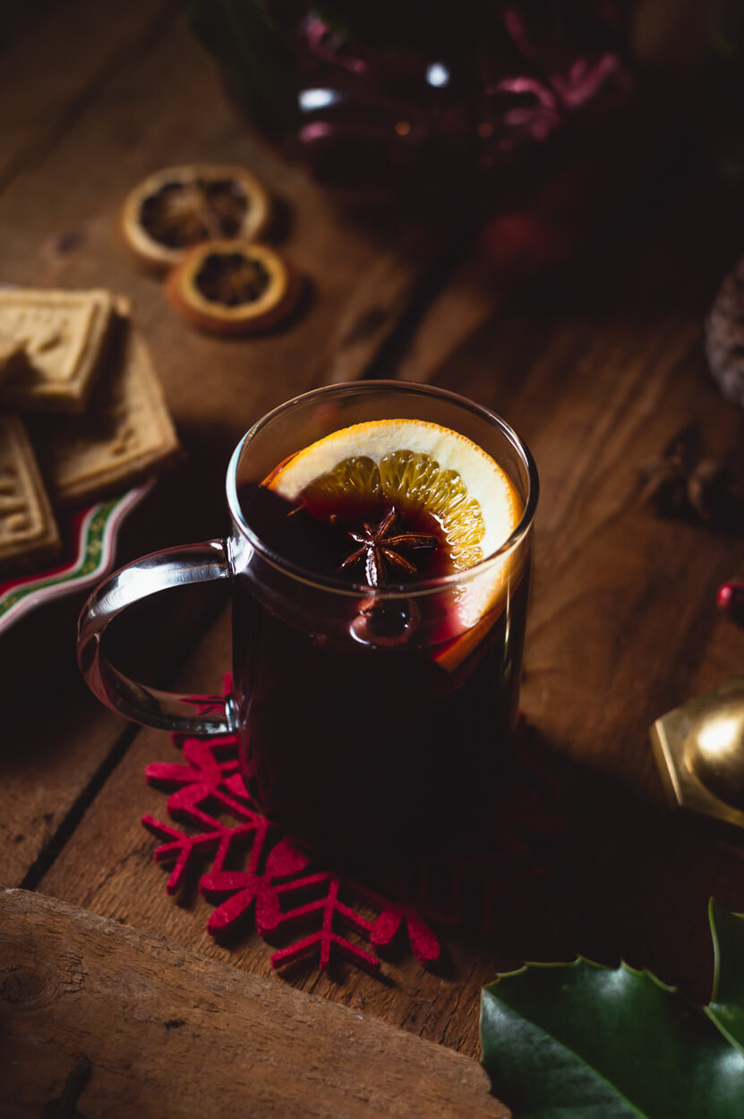 hot red mulled wine, served hot with an orange slice and star anise