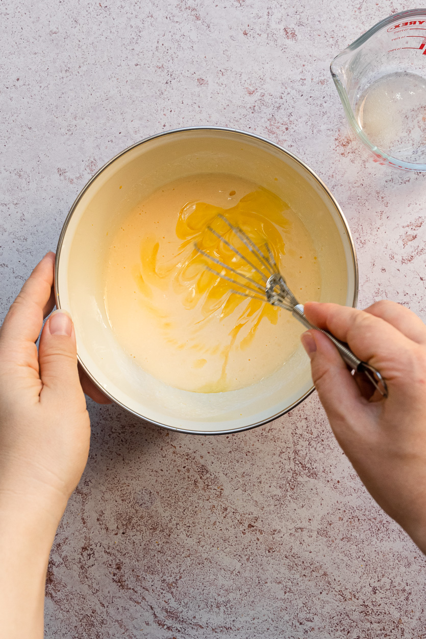 whisking in melted butter