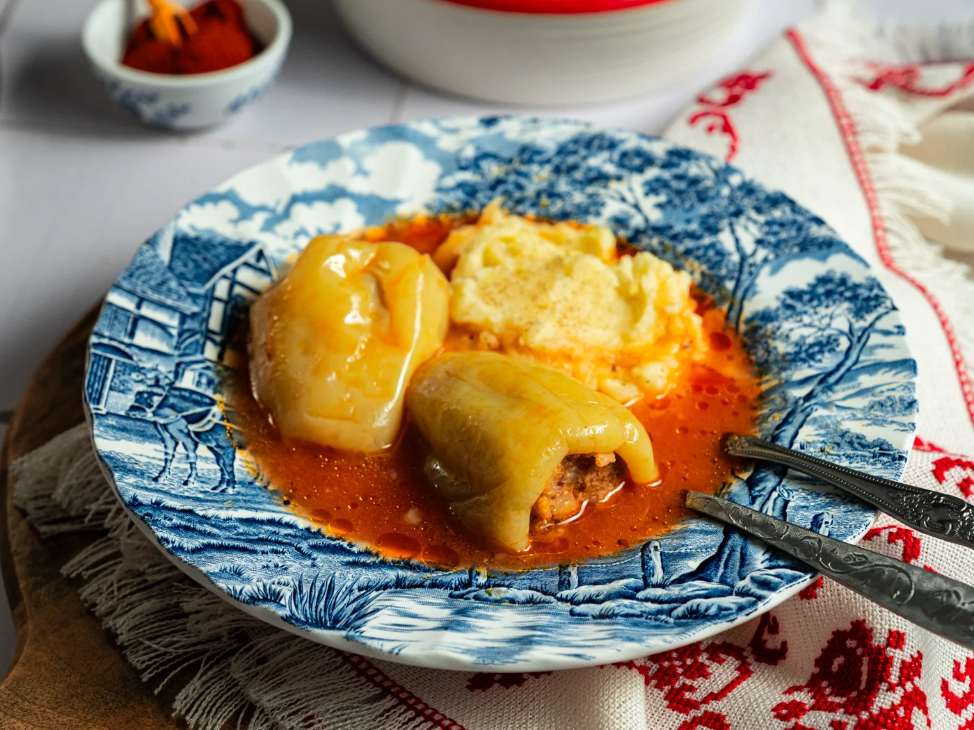croatian stuffed peppers in tomato sauce, served with mashed potatoes