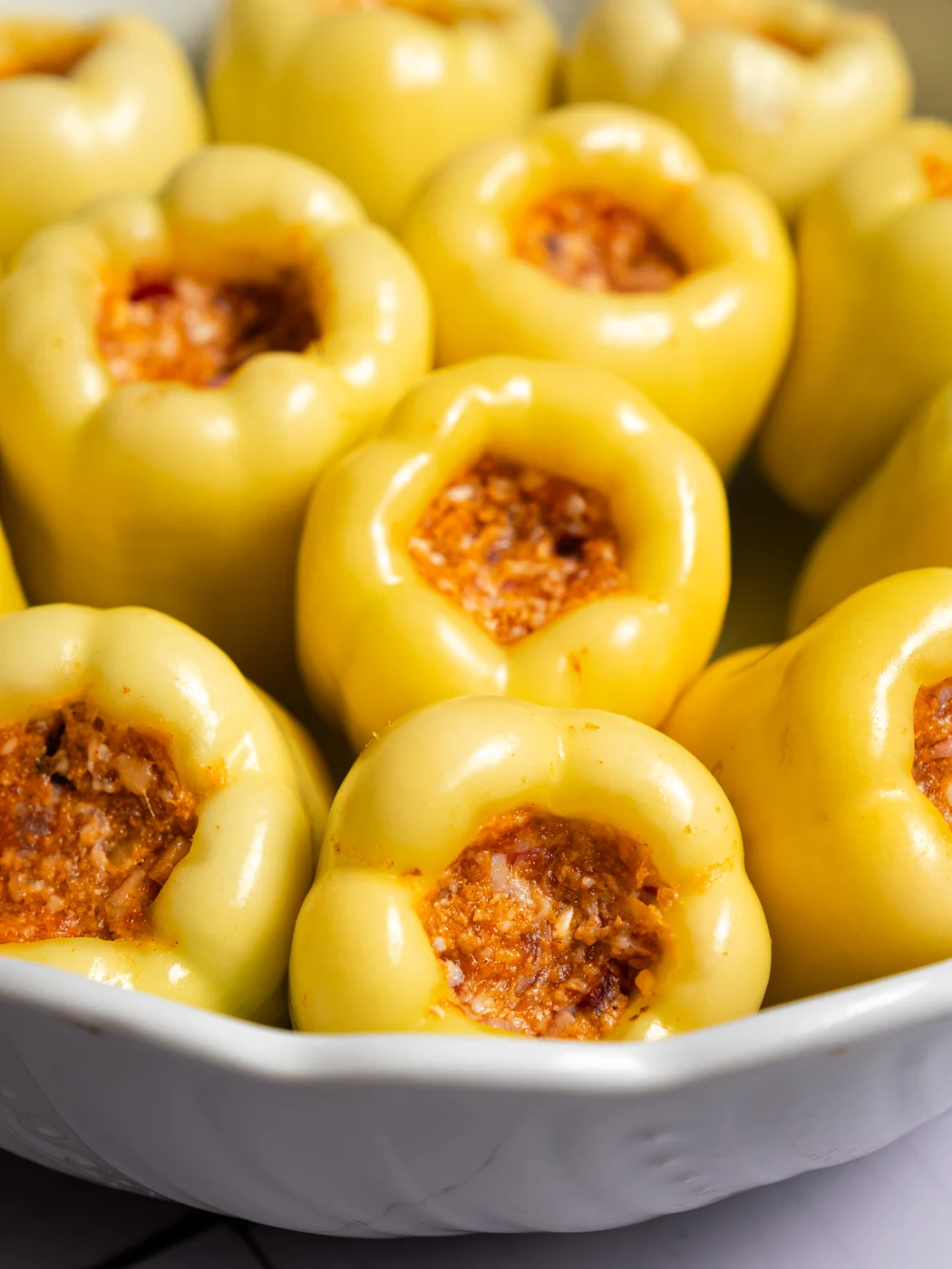 stuffed yellow bell peppers, before cooking