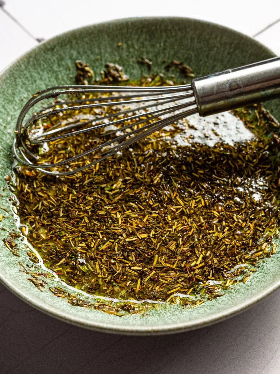 ingredients for herbes de provence marinade, mixed in one bowl