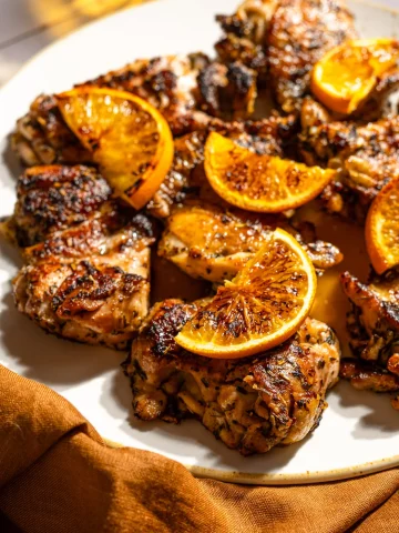 herbes de provence chicken thighs with roasted orange slices