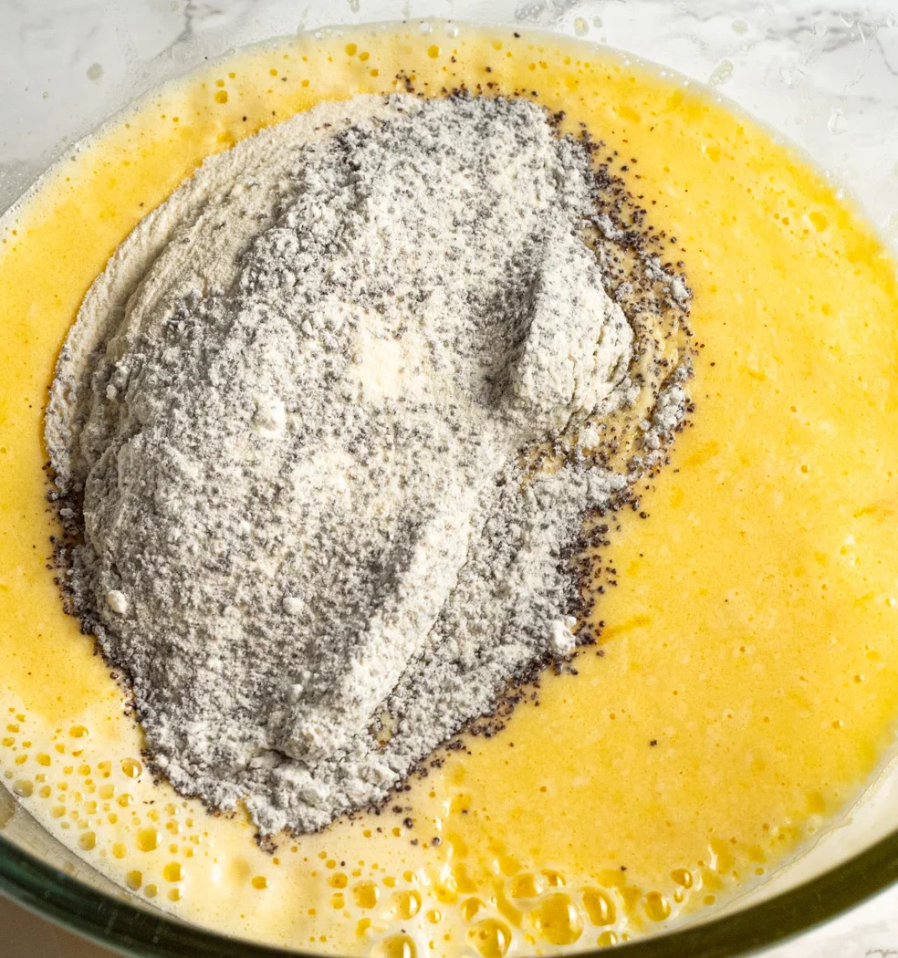 making poppy seed cake batter