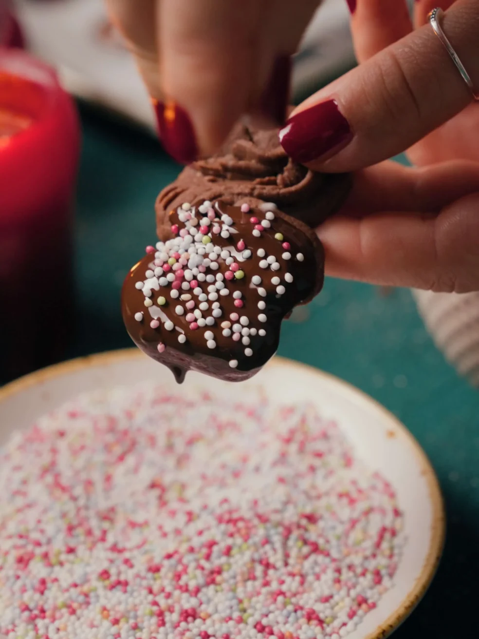 chocolate covered viennese whirls covered with sprinkles