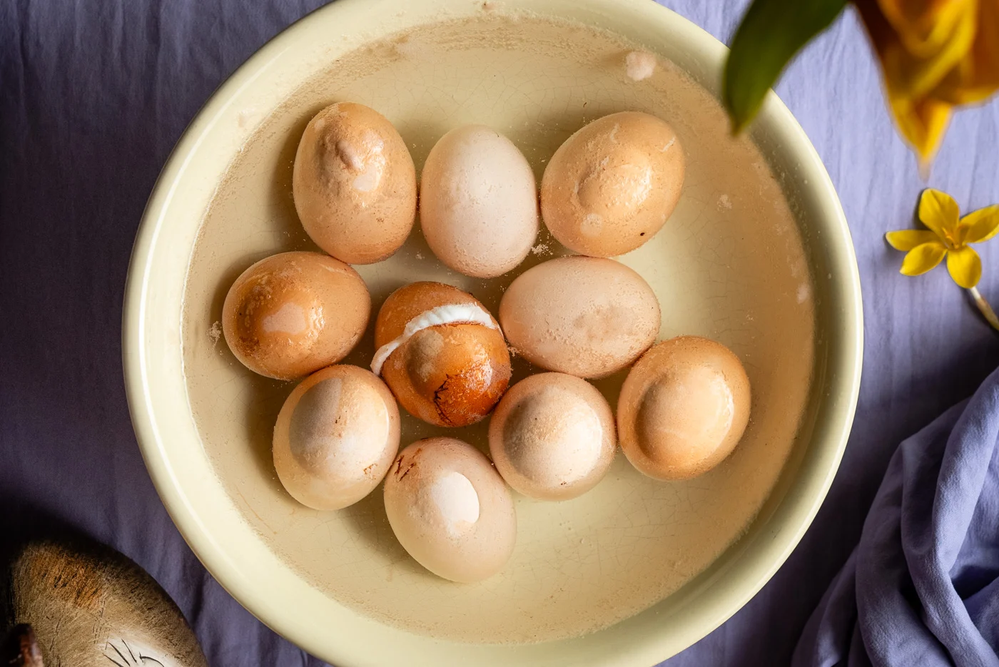 cooked eggs ready to be scrubbed away with sponge and become white.