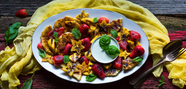 griled fruit with basil dip and balsamic reduction