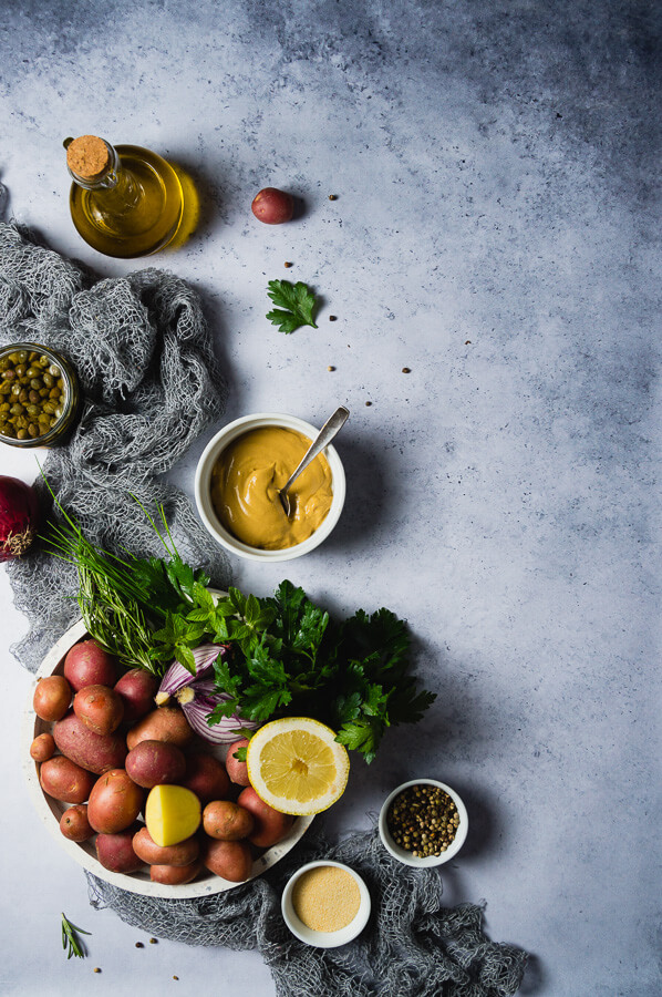 ingredients for making herbed potato salad