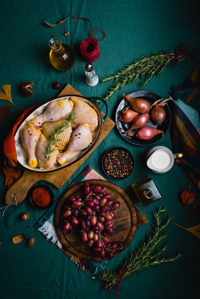 ingredients for making chicken in white wine sauce with rosemary and grapes