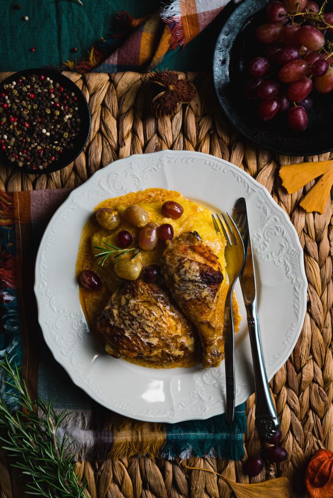chicken in white wine sauce with grapes and rosemary